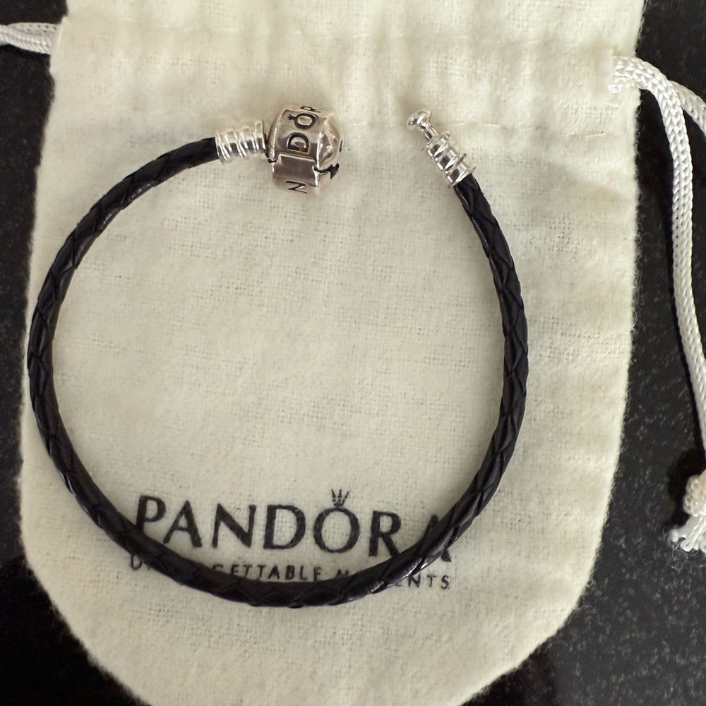Authentic Pandora Black Leather Bracelet with Sterling Silver Closure.